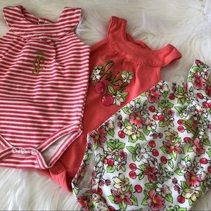 Three Juicy Couture Baby Onesies